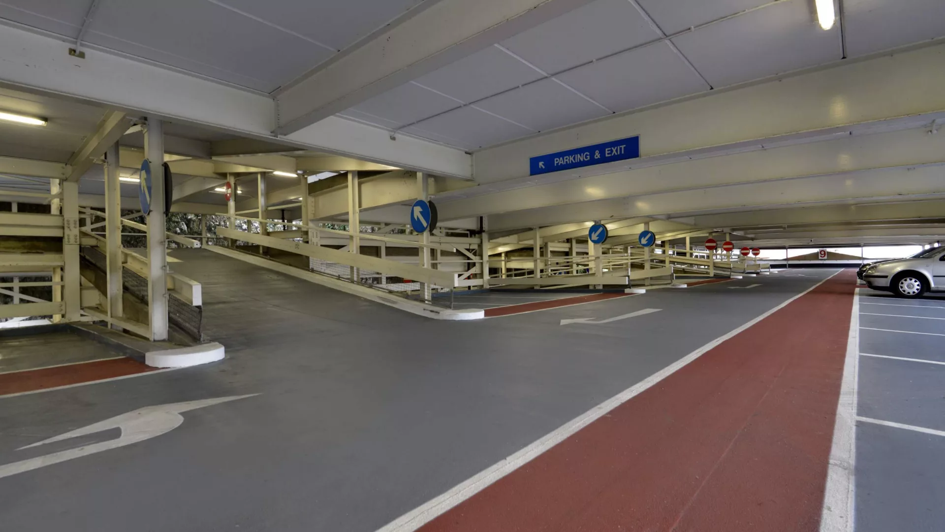 Resin decking system on a multi-storey car park deck with line marking