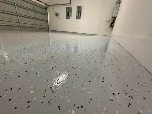 Partial broadcast flake floor with flakes over a visible base colour